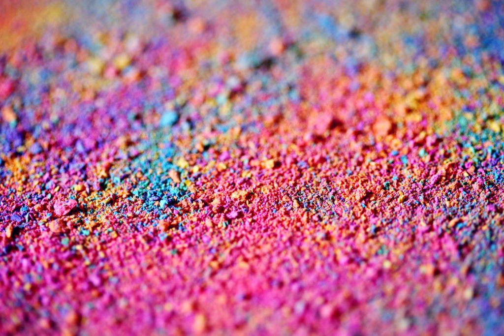 Image of bright, multi-colored chalk dust to tie in with the brand building example of Hagoromo chalk