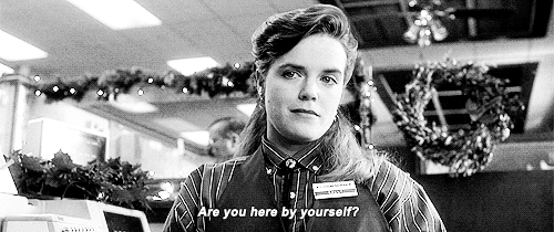 gif of cashier woman asking "Are you here by yourself?" in a nostalgic scene from Home Alone