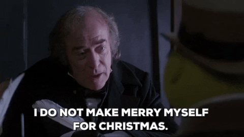 Scrooge saying "I do not make merry myself for Christmas" to Kermit the Frog in a movie scene, which is reminiscent of brands behind holiday marketing campaigns looking to maximize revenue