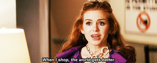 Actress Isla Fisher saying "When I shop, the world gets better" - which ties in with holiday marketing psychology because consumers want to make purchases that they feel will have positive impact, especially during the holidays
