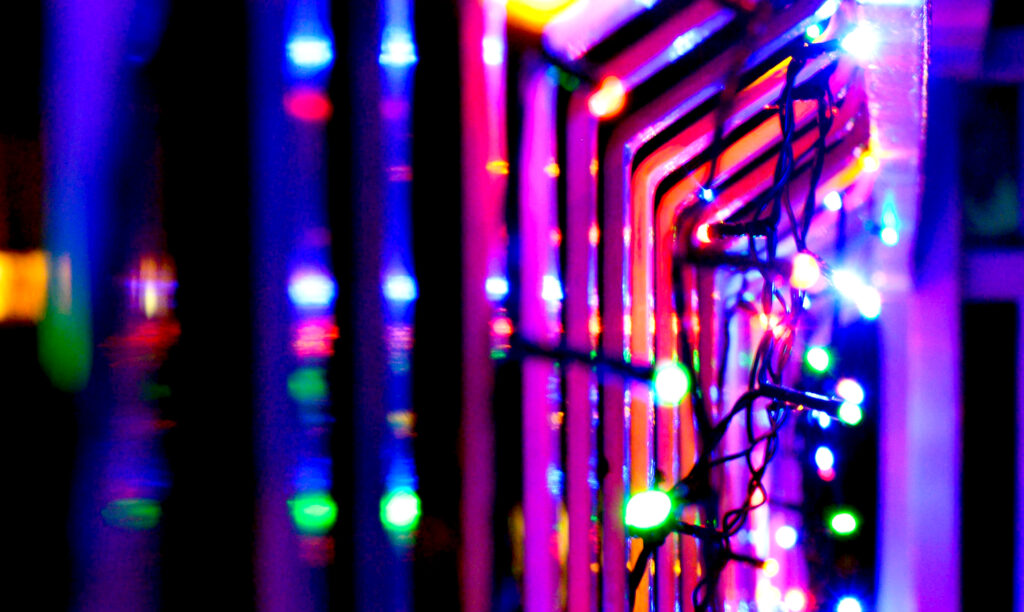 holiday lights in various colors for article on ways to use marketing psychology to improve holiday sales and campaigns