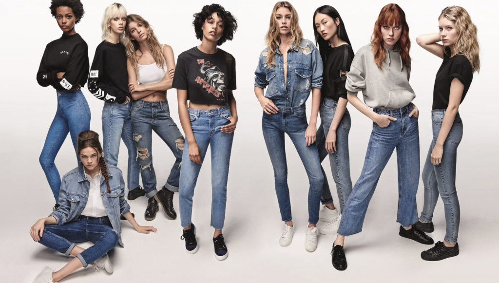 an ad depicting a group of young models wearing topshop brand fashion with the goal of targeting gen-z and millennial marketing demographic