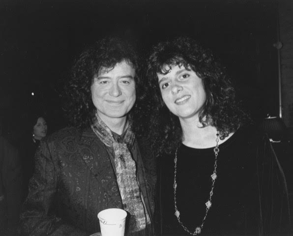 Entertainment marketing executive Kim Kaiman and and Jimmy Page (of Led Zeppelin) smiling for a photo.